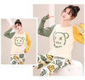 Woman wearing multi smile bear printed cotton jersey night dress with cute graphic top and matching pajama bottoms