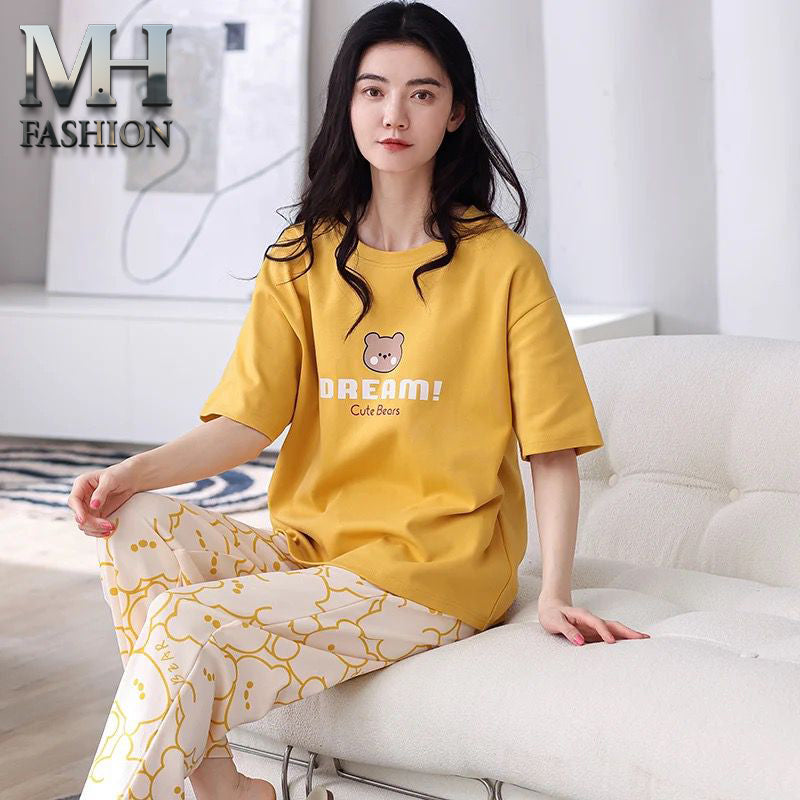 Woman wearing cute bear printed cotton night dress soft comfortable sleepwear for home and bedtime